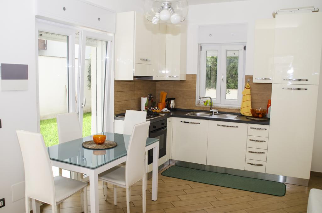 Sun Garden L.T. Apartment Fiumicino Bagian luar foto